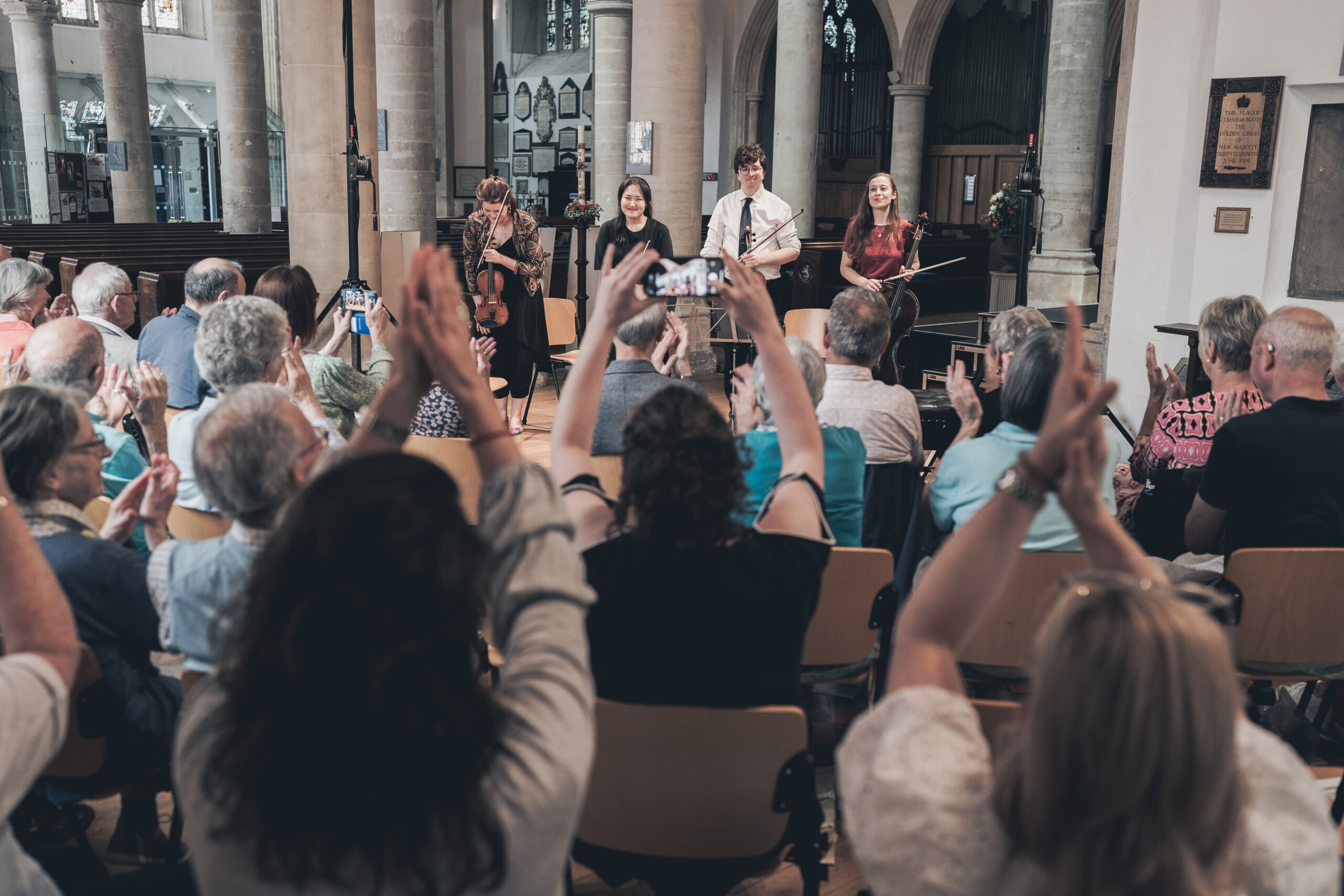 Chiltern Arts Volunteering Image shows an audience clapping at a concert